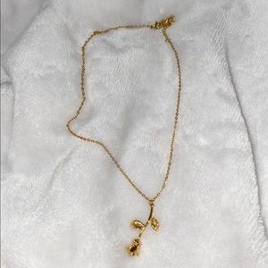 Yellow gold colored rose necklace
